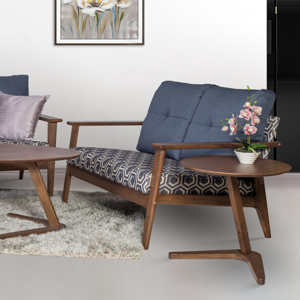 Minimalist living room with white wall and colorful sofa – rendering